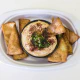 Plate with hummus and pita chips