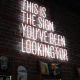 Neon sign saying 'This is the sign you have been waiting for'