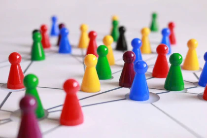 Meeples on a game board