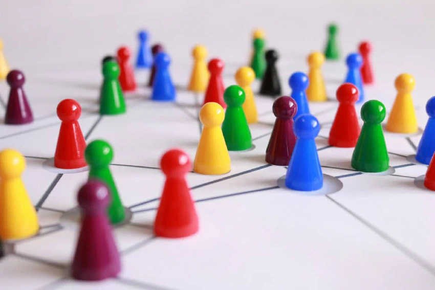 Meeples on a game board