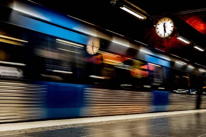 Subway train rushing through a station in Stockholm