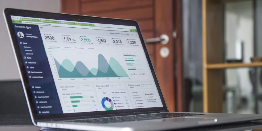 Open laptop showing graphs and charts